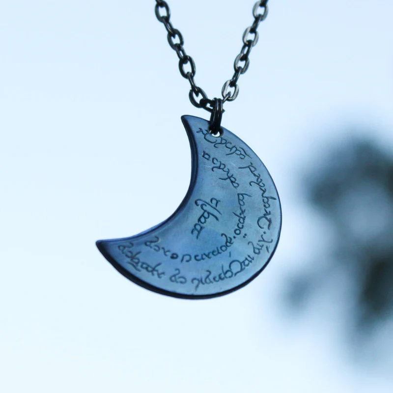 Other side of moon coin with Elvish text