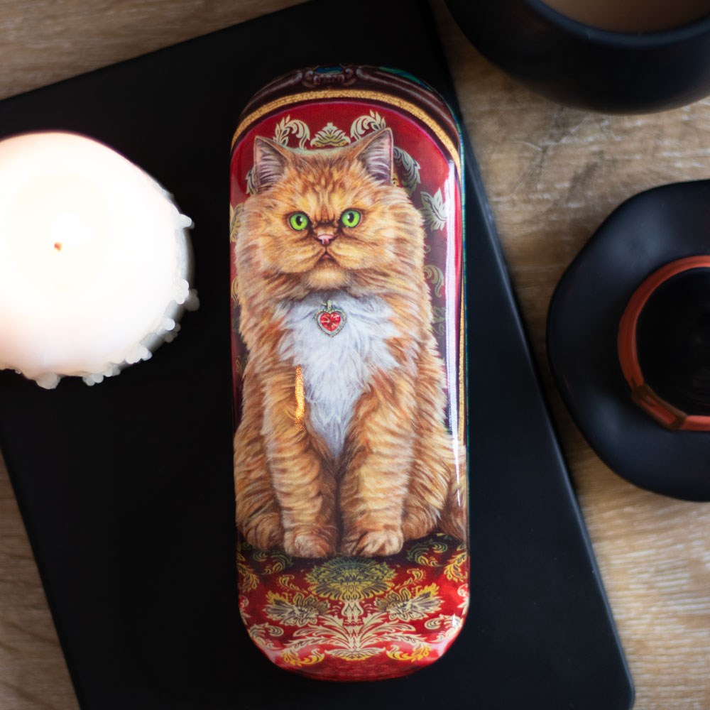 Eyeglass case with orange and white cat with crystal heart collar on red chair