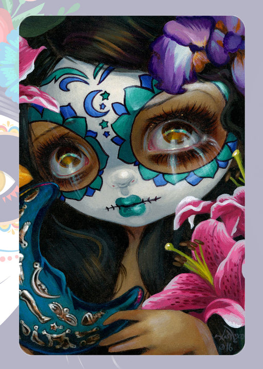 Magnet with lady with painted sugar skull face, holding crescent mon, with lilies and iris flowers
