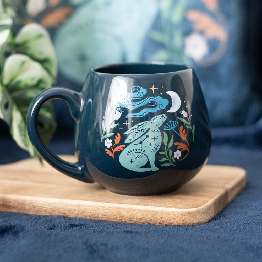 Ceramic mug with moon gazing hare in green with flowers