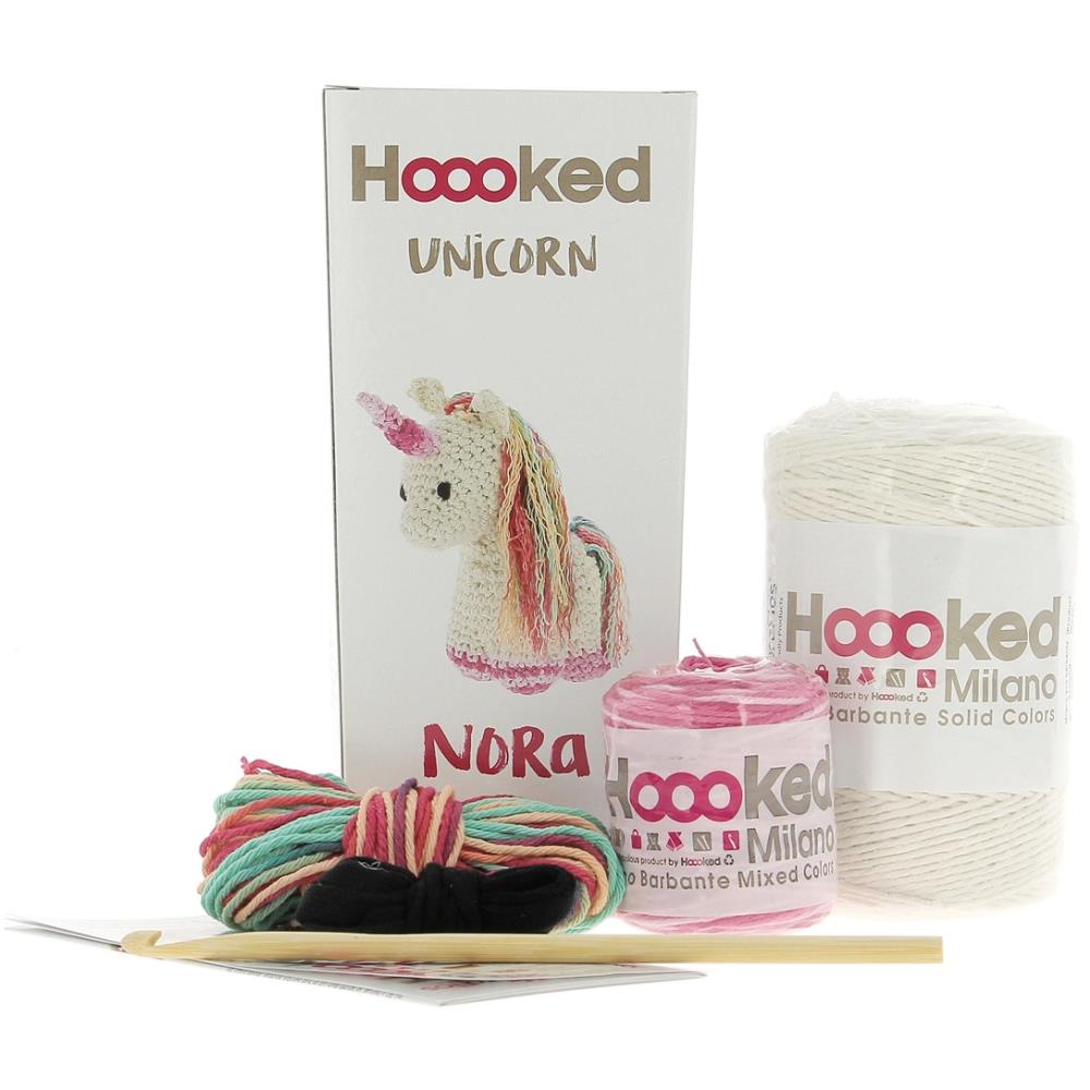 Crochet unicorn amigurumi kit with yarn, hook, and instructions