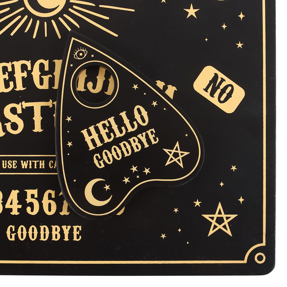 Set of placemat and coaster, done to look like talking board and planchette with alphabet and words and numbers. Black with gold