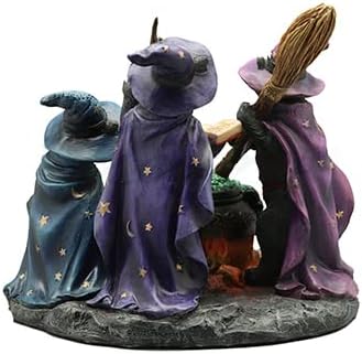 Figurine of three black cats and a frog casting a spell in a bubbling cauldron, dressed in hats and cloaks