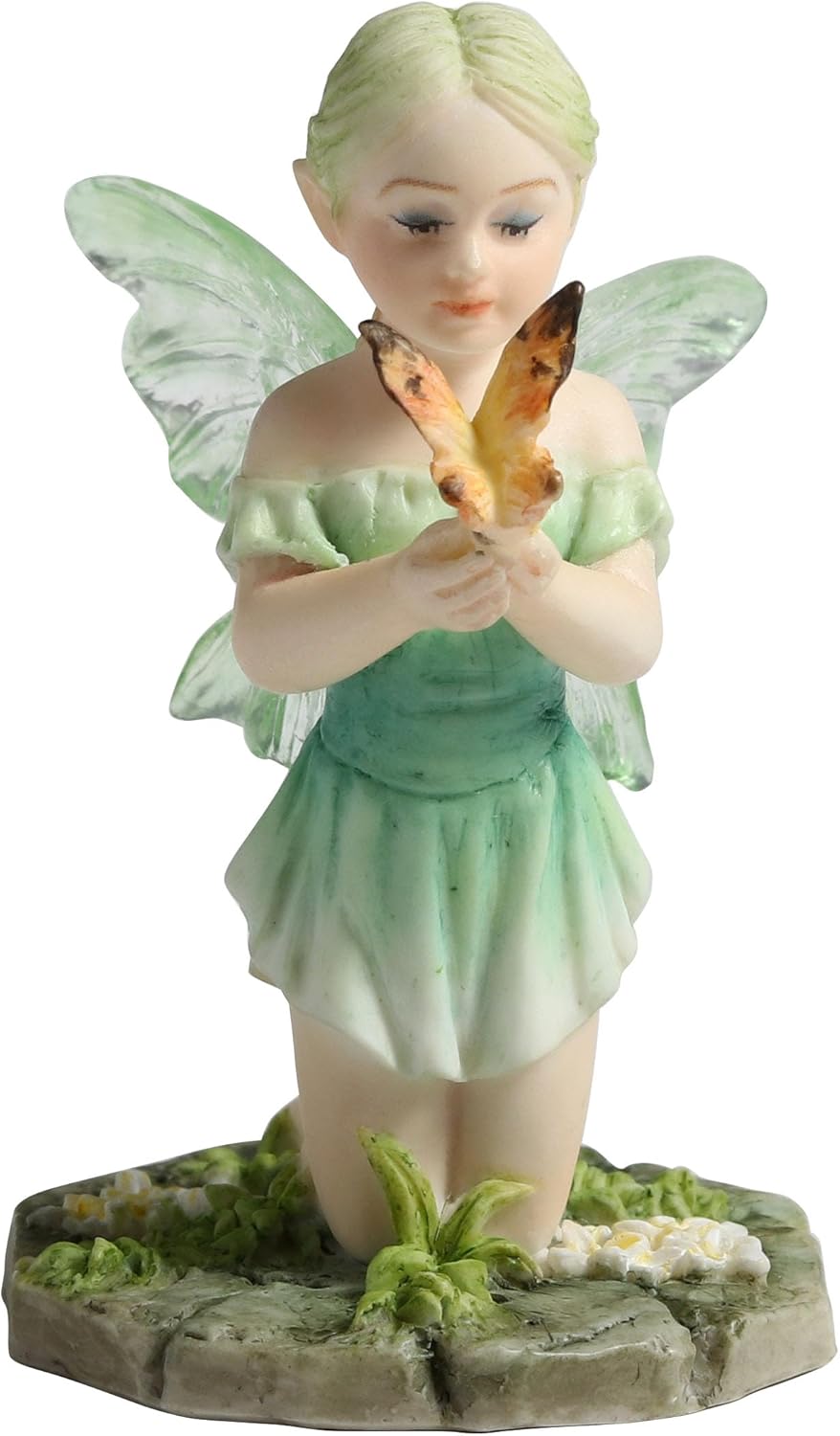Figurine of fairy in pale green, kneeling with a butterfly