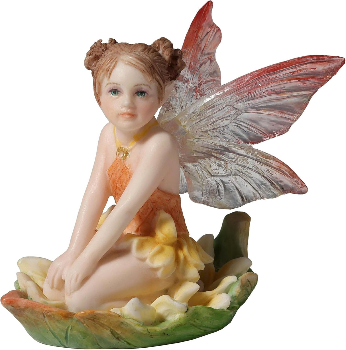 Figurine of fairy in yellow-orange dress with pink and clear wings, reddish-brown hair, blue eyes sitting in a leaf