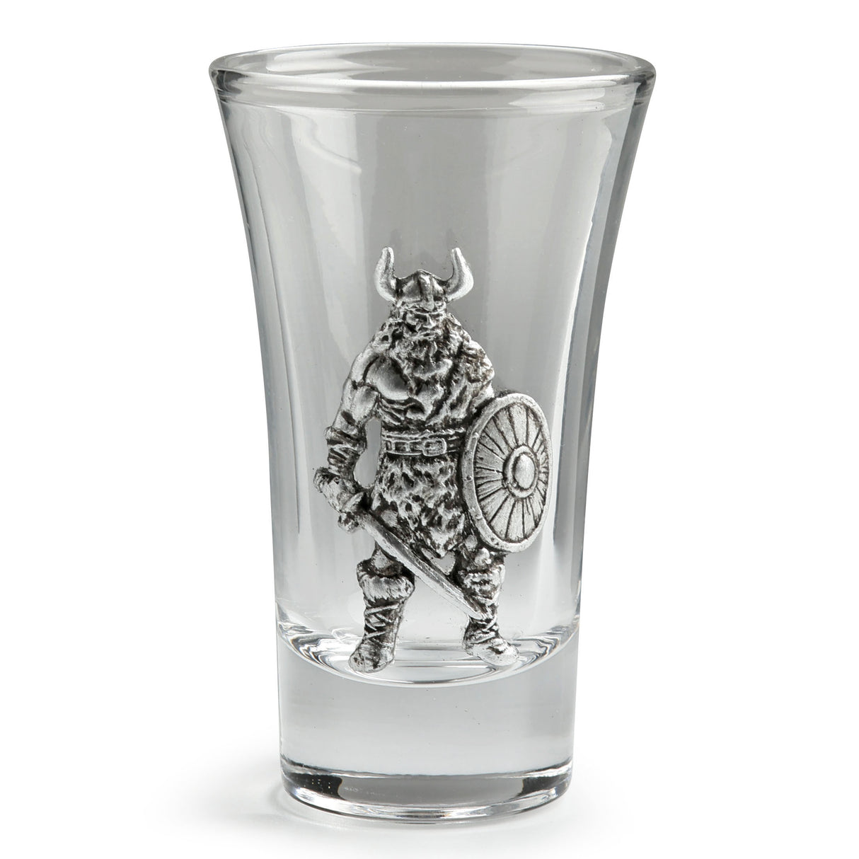 A clear glass shot glass featuring an embossed pewter Viking warrior holding a shield and sword