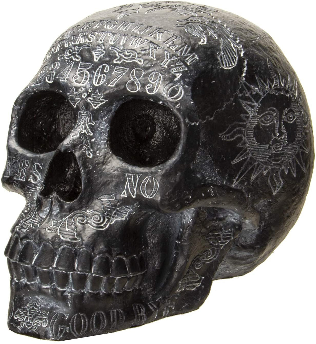Resin black skull with silver-white ouija board markings on it