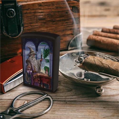 Zippo lighter showing a wizard with crystal ball and staff, with dragon outside. Shown with cigar