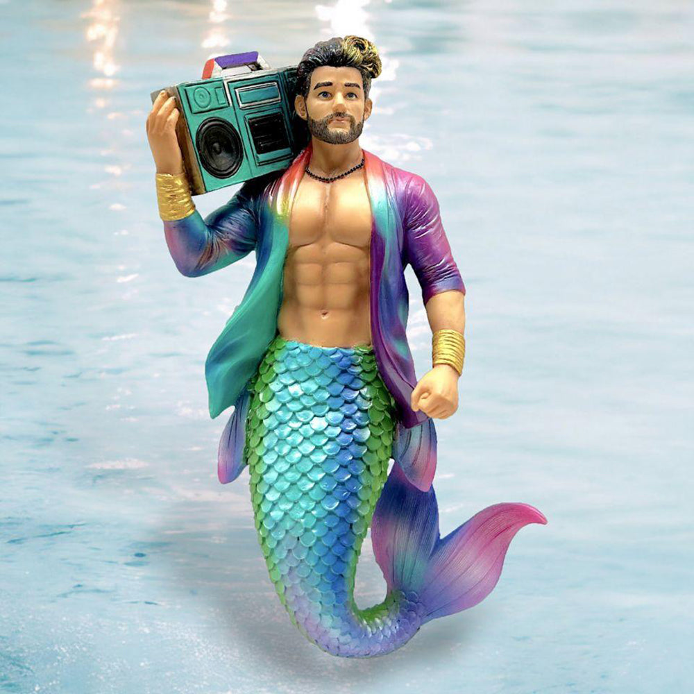 Mermaid figurine with male human upper body holding a boombox, rainbow scaled tail