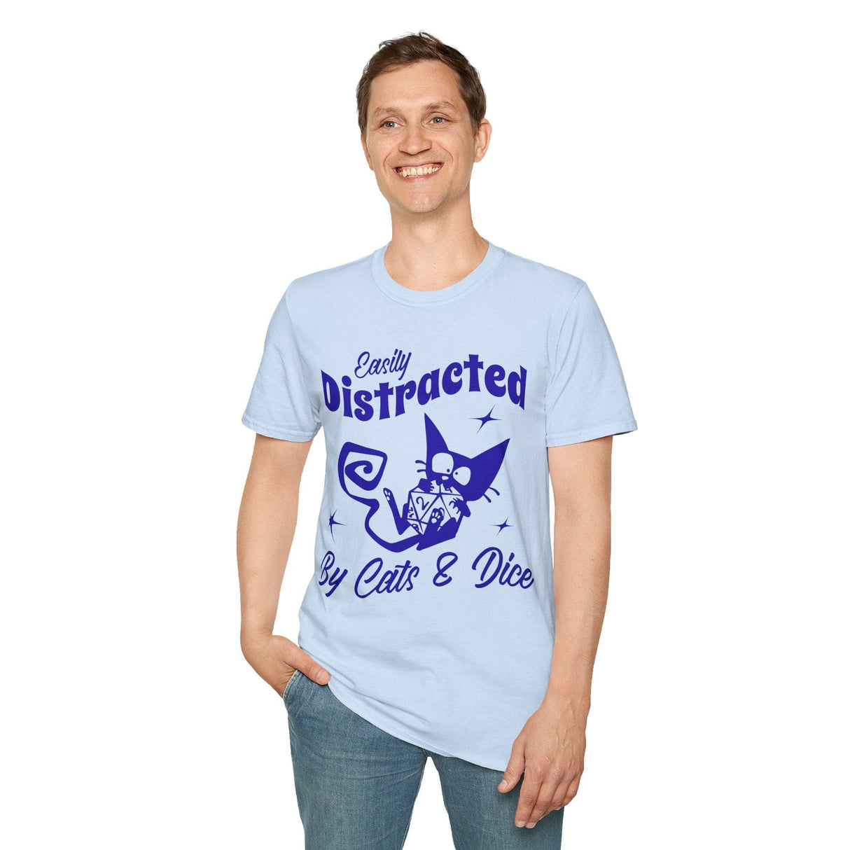 Man wearing light blue t-shirt with purple graphic and text 'Easily Distracted By Cats & Dice'