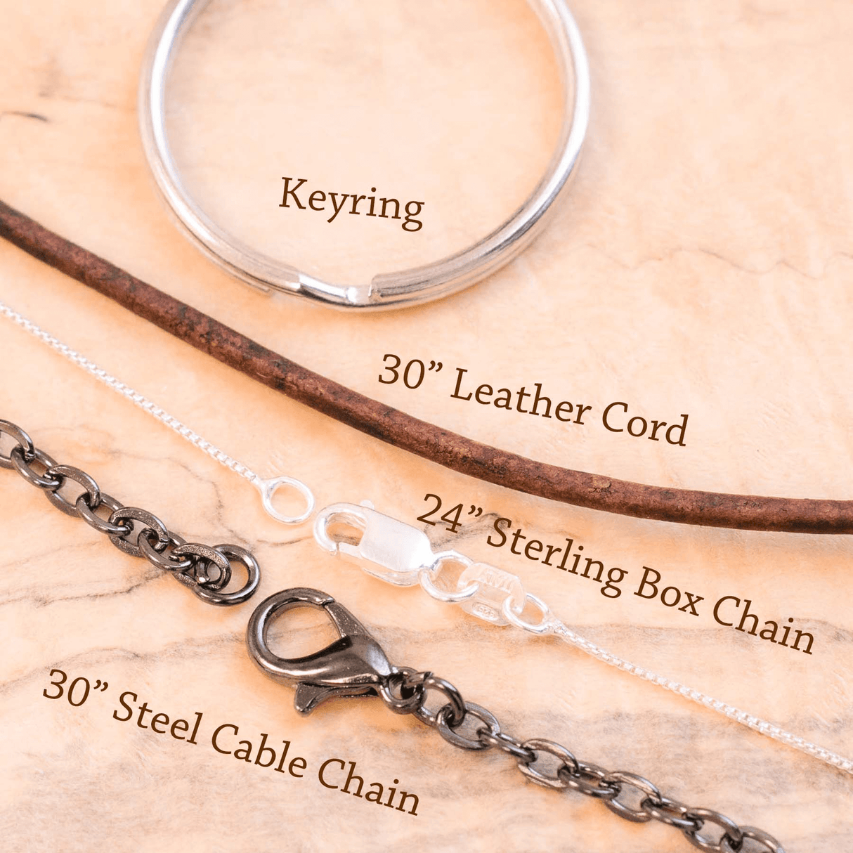 Options for charm - keyring, leather cord, sterling box chain, black steel cable chain