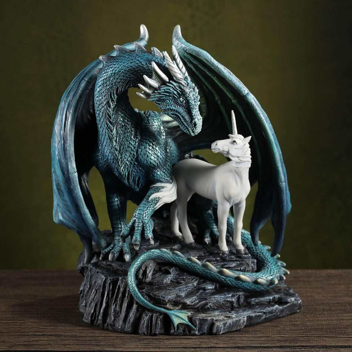 Green-blue dragon and unicorn stand together on a rock