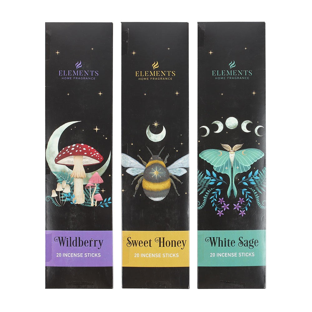 Three packages of incense with dark forest imagery. Wildberry, Sweet Honey, and White Sage