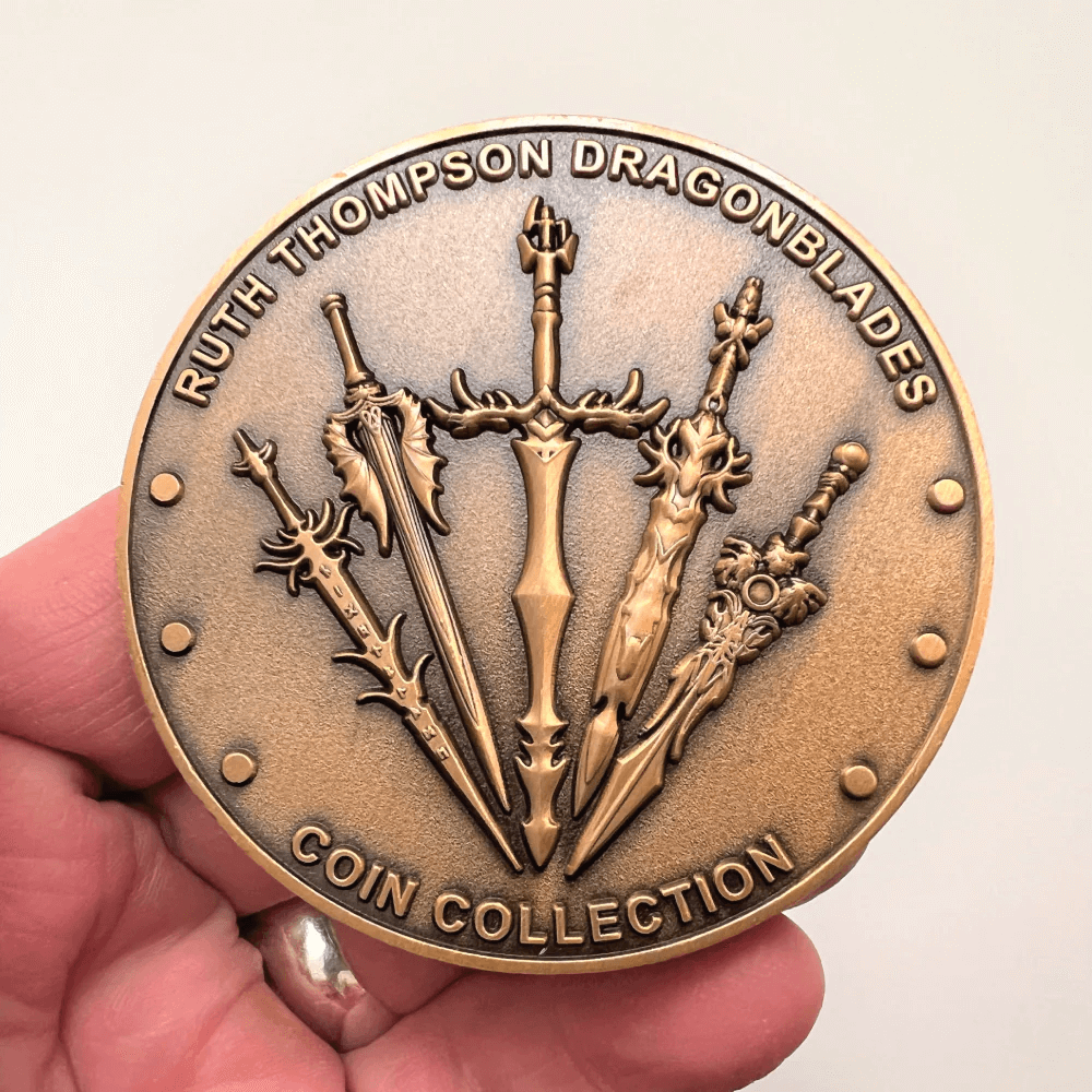 Back of coin, Ruth Thompson Dragonblades Coin Collection with swords