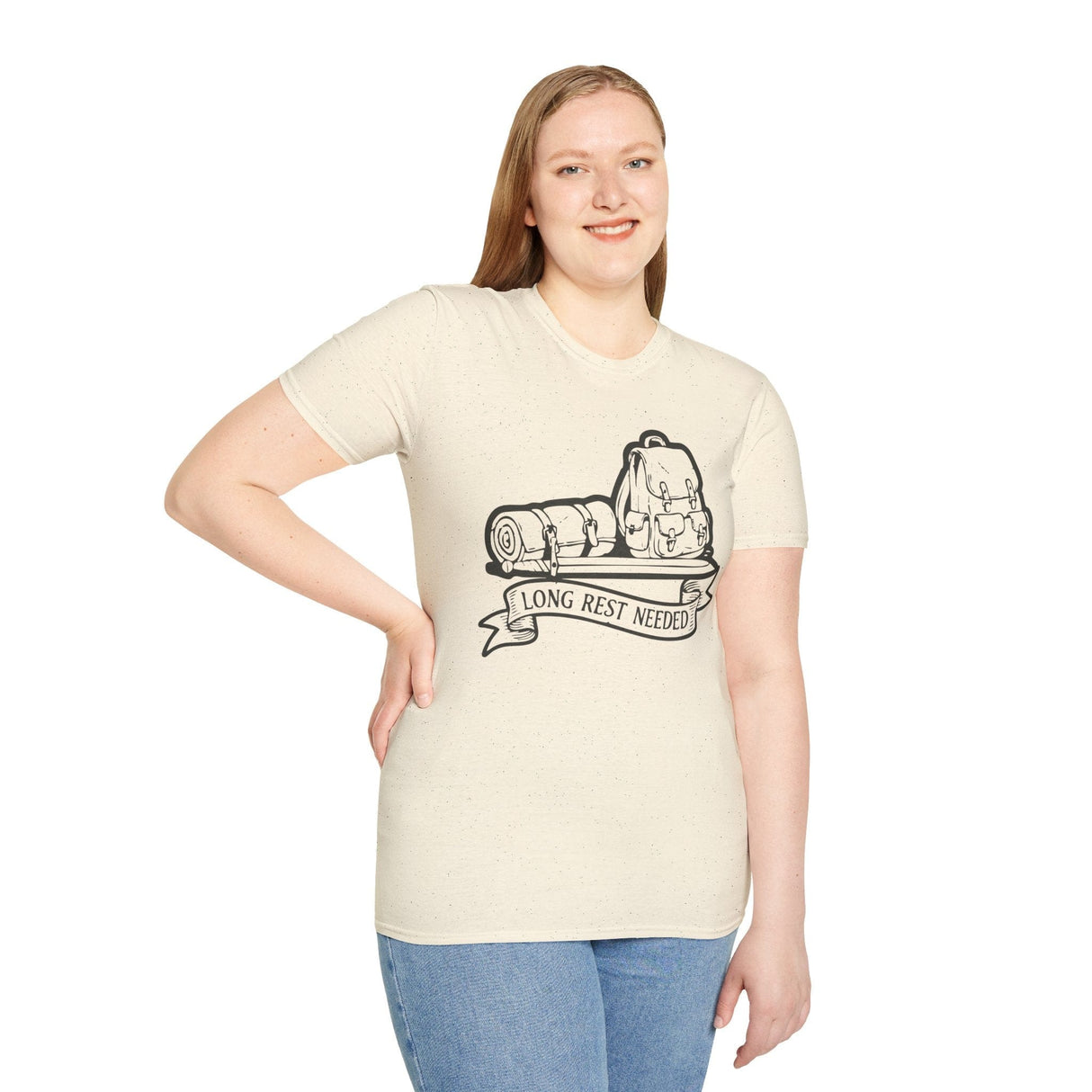 Woman wearing cream/off white t-shirt with a backpack, sword and sleeping bag graphic and 'Long Rest Needed' text