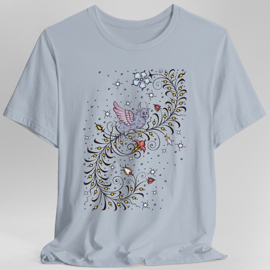 Light blue t-shirt with a medieval manuscript dragon and floral design
