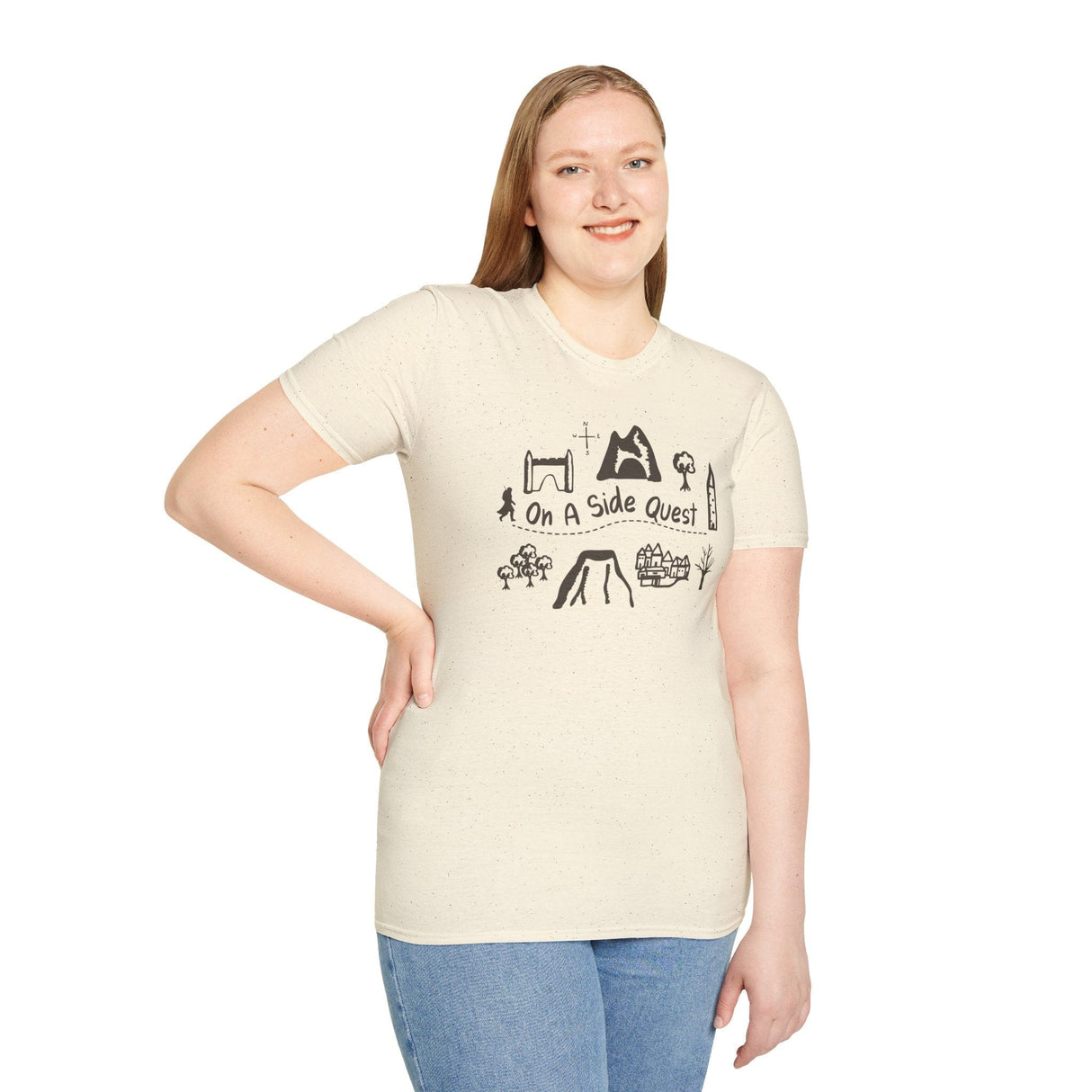 Woman wearing off white t-shirt with adventuring graphics and the phrase "On A Side Quest"