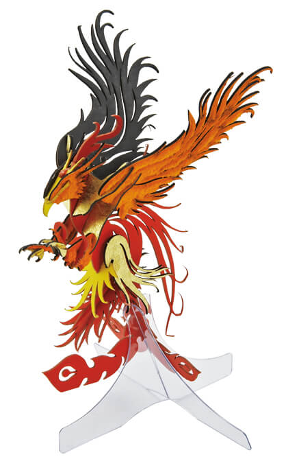Assembled 3D paper puzzle of a red, orange and yellow phoenix (firebird)