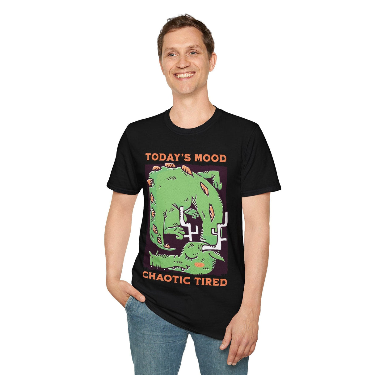 Person wearing black t-shirt with a graphic of a green dragon and text 'Today's Mood: Chaotic Tired'