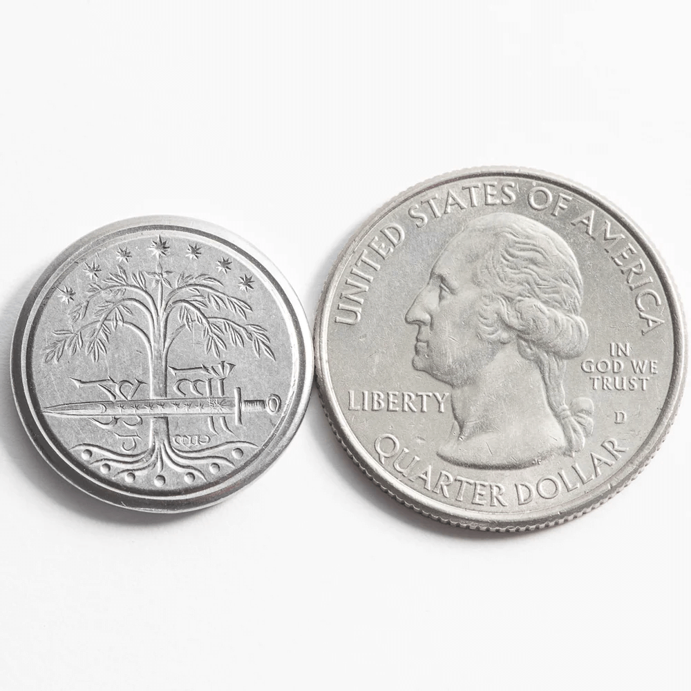 Wax seal stamp coin of Tree of Gondor with Sword, shown with quarter for size comparison