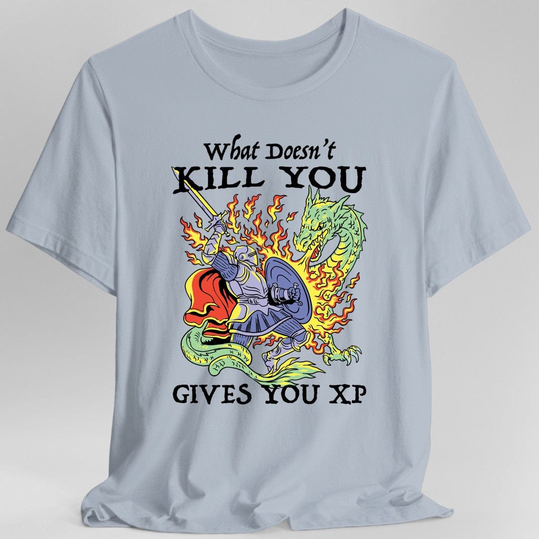 Light Blue t-shirt with a graphic design of knight fighting a dragon and text reading "What Doesn't Kill You Gives You XP"