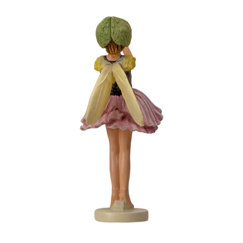 Cicely Mary Barker Flower Fairy Figurine dressed in a poppy blossom of pink and green with pale yellow wings
