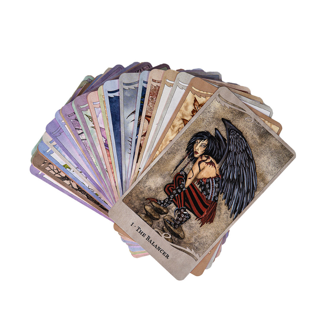 Card examples showing The Balancer fairy with black feathered wings on the top of the deck