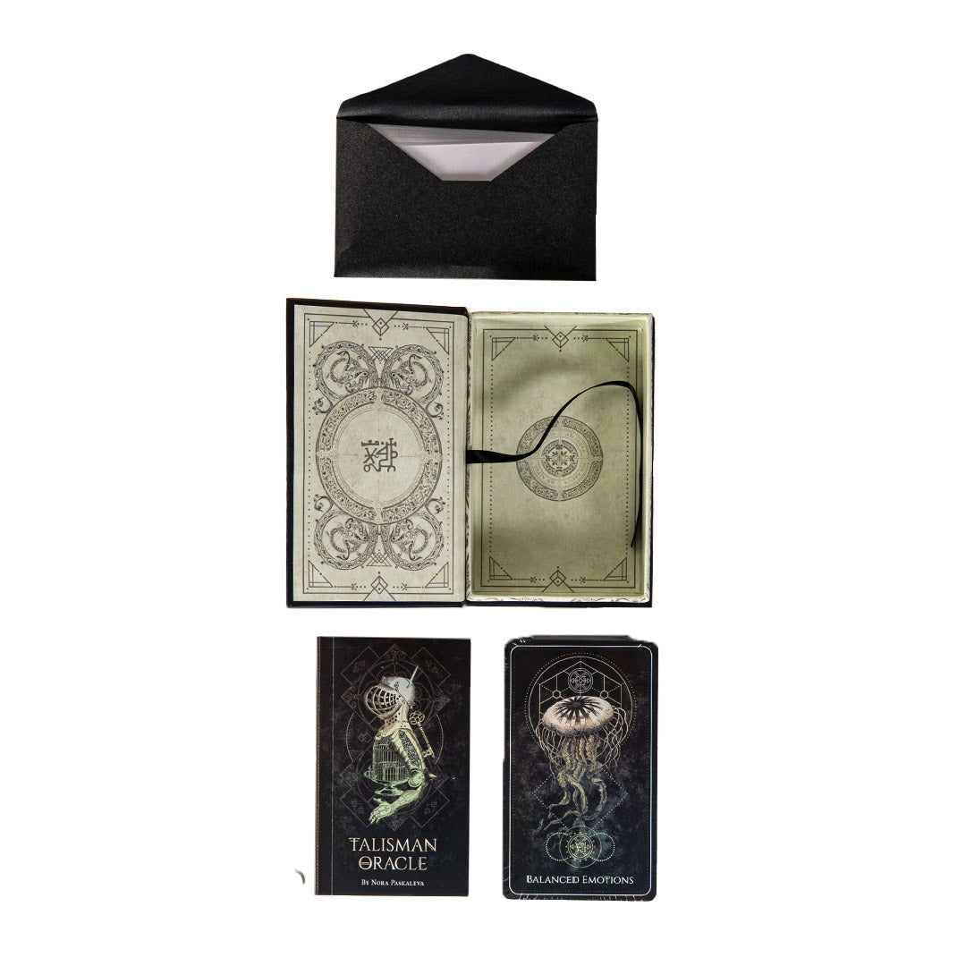 Talisman oracle deck showing envelope with cards, box, guidebook