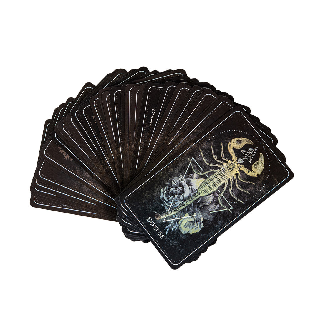 Card deck showing scorpion on the "Defense" card