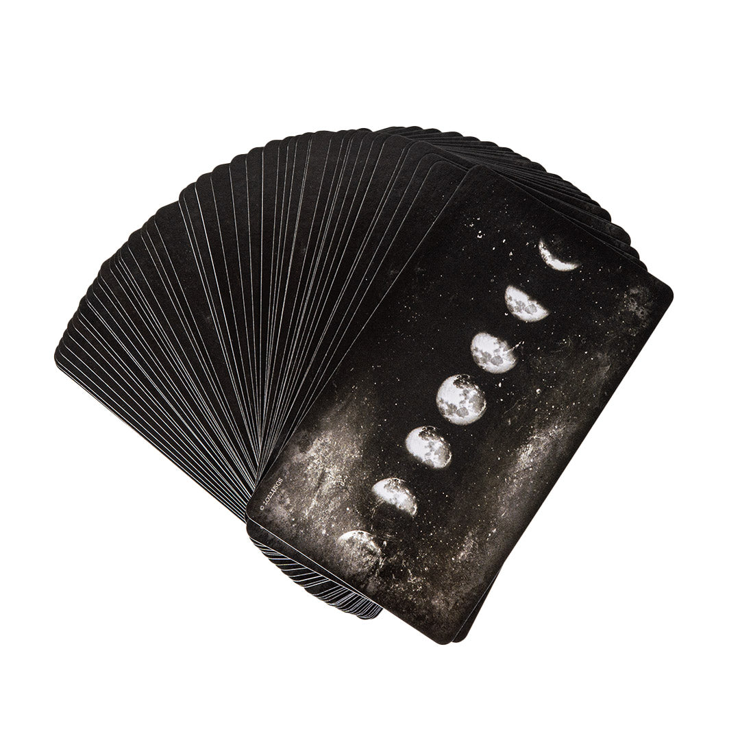 Fanned deck of cards showing the backs, with moon phase design