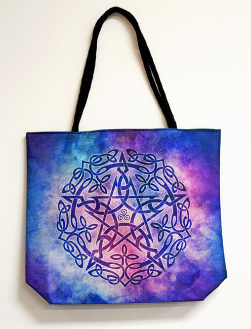 Purple galaxy background with a Celtic knot pentagram design tote bag with black rope handles