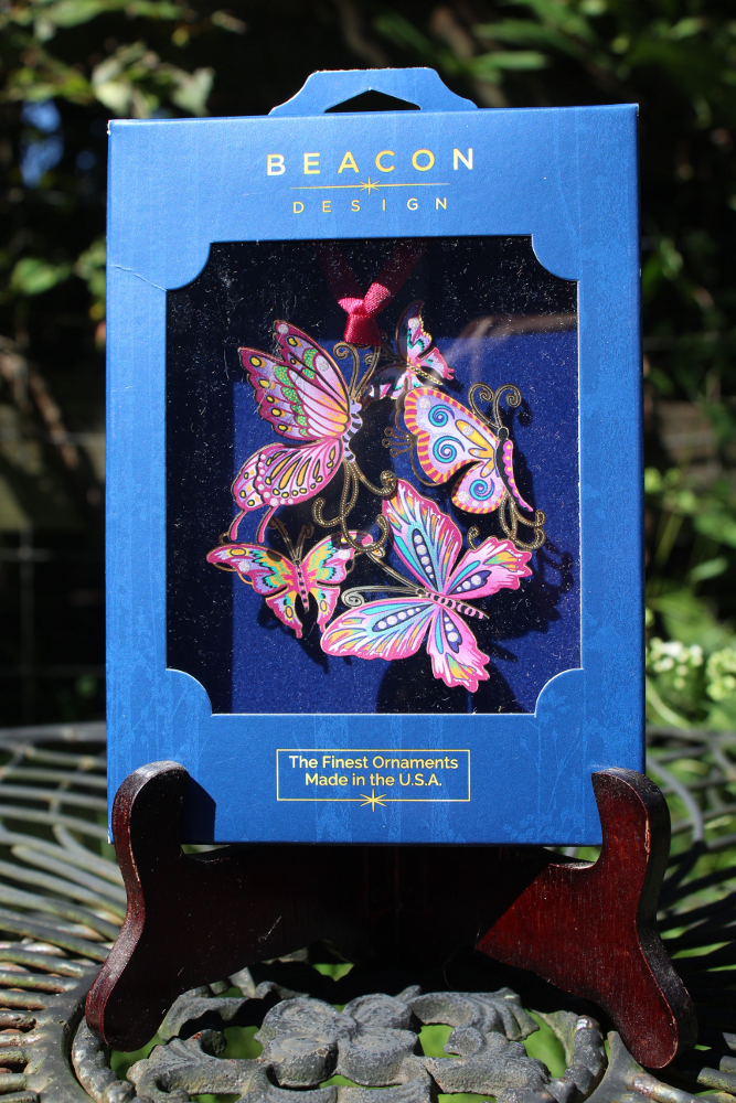 Butterfly Collage ornament shown in blue Beacon Design window box with text "The Finest Ornaments Made in the USA"