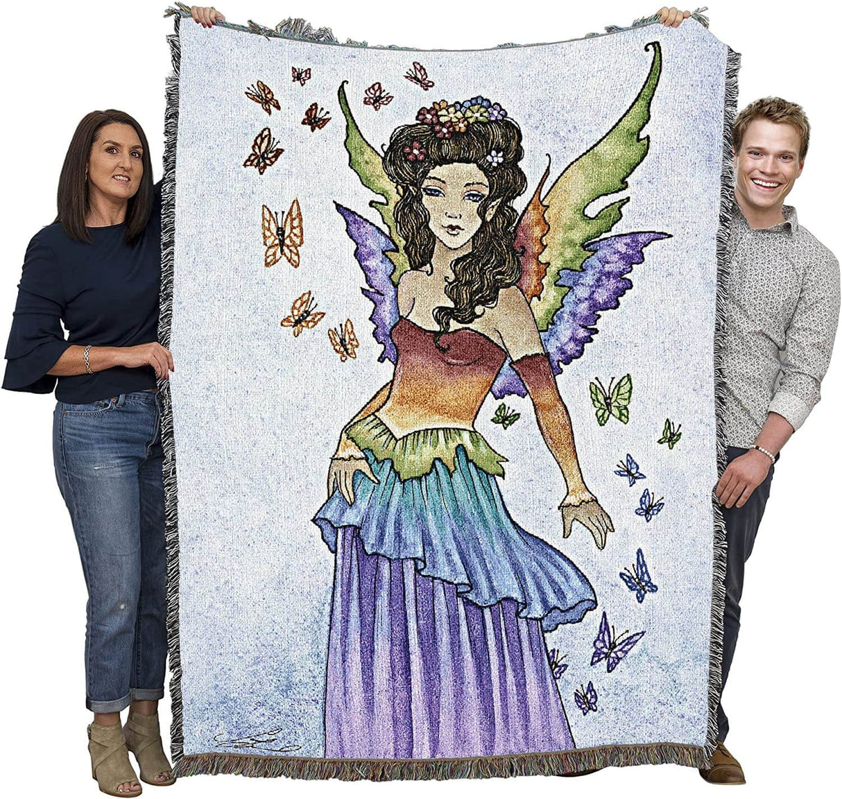 Rainbow fairy and butterfly tapestry blanket held up by two adults to show large size