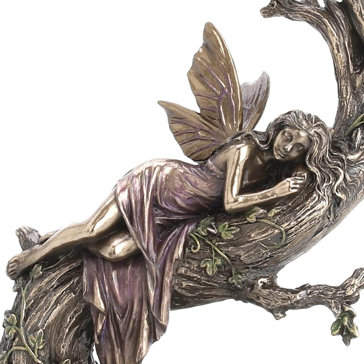 Close up - Fairy in pink dress slumbering on a tree with ivy vines above a pond. Done in metal colors with subtle hues overlaid.