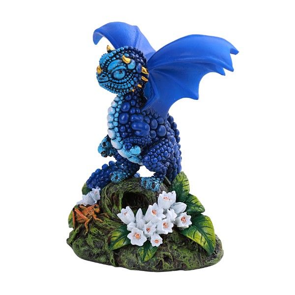 Figurine of a blue dragon themed after a blueberry, next to white flowers, with a cricket on the base