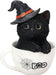 Black kitten in a white teacup. Cat wears a witch hat and the cup says "BOO" with a spiderweb