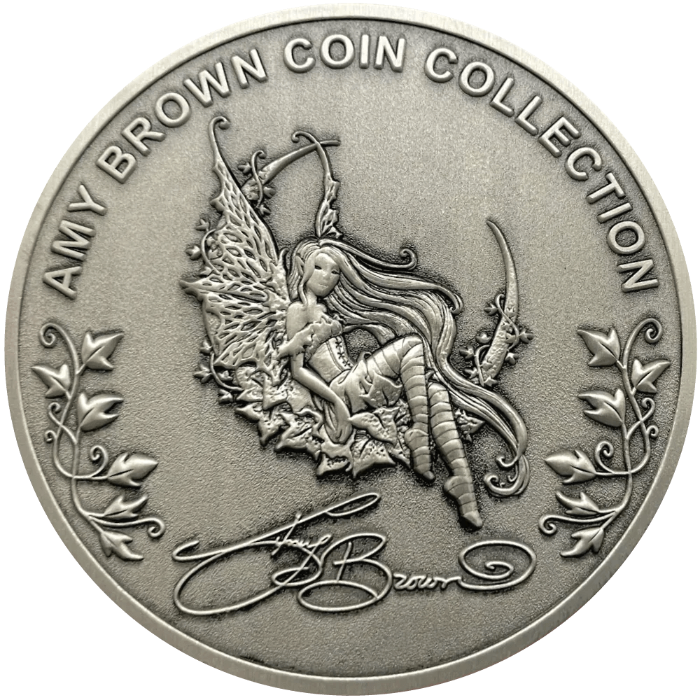 Back of coin showing fairy in ivy and Amy Brown signature