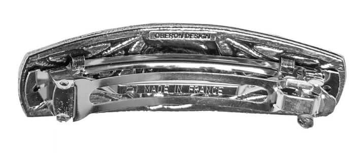 Hairclip with snap mechanism, shown from the back