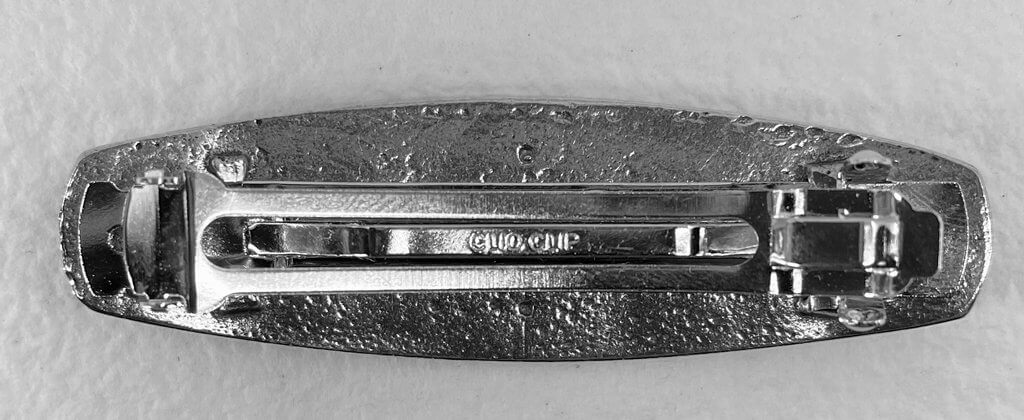 Back of spiral hairclip, showing barrette clip