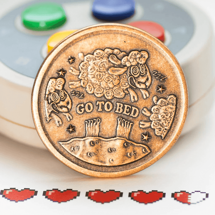 Alternate side of decision maker coin, showing sheep and the instructions "Go To Bed"