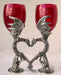set of dragon wedding wine glass positioned to form a heart with dragons nuzzling and inlayed with gems