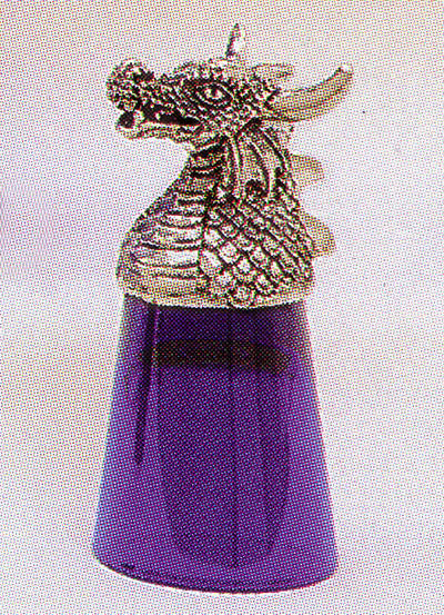 glass shot glass with pewter dragon head as base