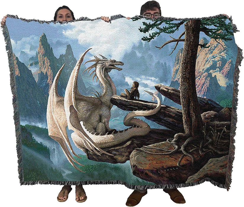 White dragon blanket held up by two adults to show large size