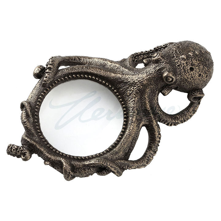 Octopus magnifying glass. Tentacles form a ring around the glass.