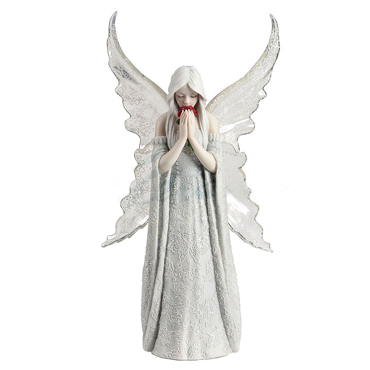 Angel figurine in white with transparent wings holding red rose