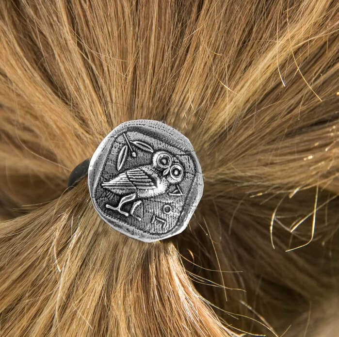 Athena's Owl ponytail holder in use