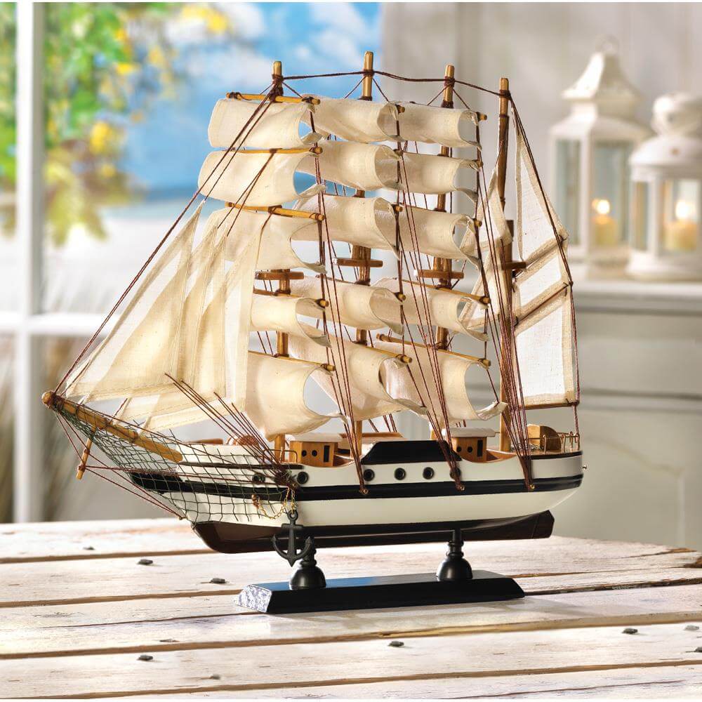 Model ship displayed on a wooden table