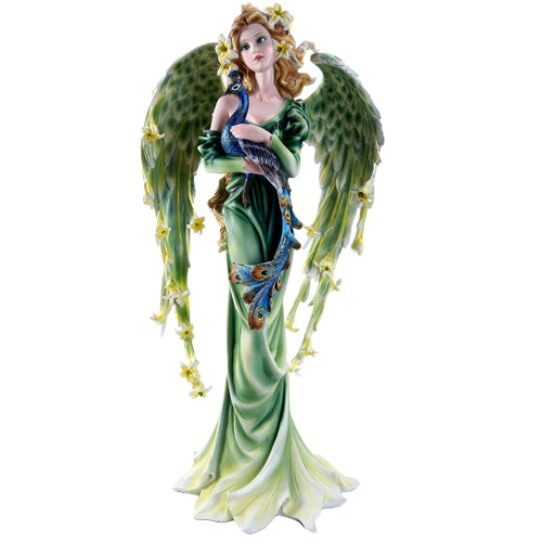Figurine of a fairy with green wings and flowers, holding a peacock