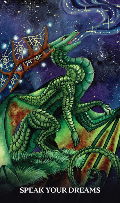 Card by Carla Morrow shows a green dragon with tree branch horns and spiderwebs, breathing stars into the sky. Text reads "Speak your dreams"