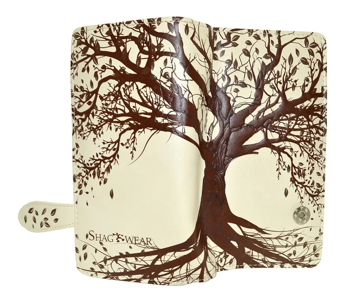 this wallet provides the perfect place for your money and cards! The full, front-to-back design shows off an old tree, branches twining to the sky and roots spreading out below. Leaves flutter from the branches. Full pattern shown with wallet open.